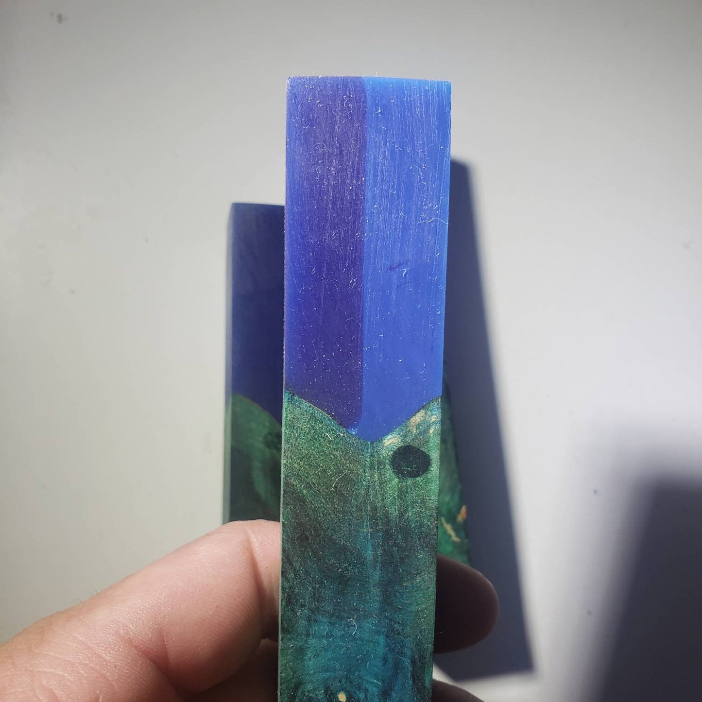 Dye stabilized hybrid pen blanks.