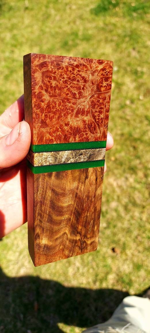 Stabilized walnut,buckeye burl and maple burl segmented knife block.