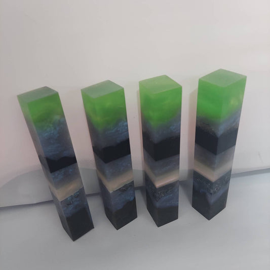 Segmented Alumilite resin pen blanks.