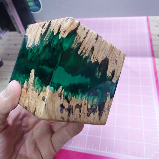 Stabilized maple burl hybrid resin cube.